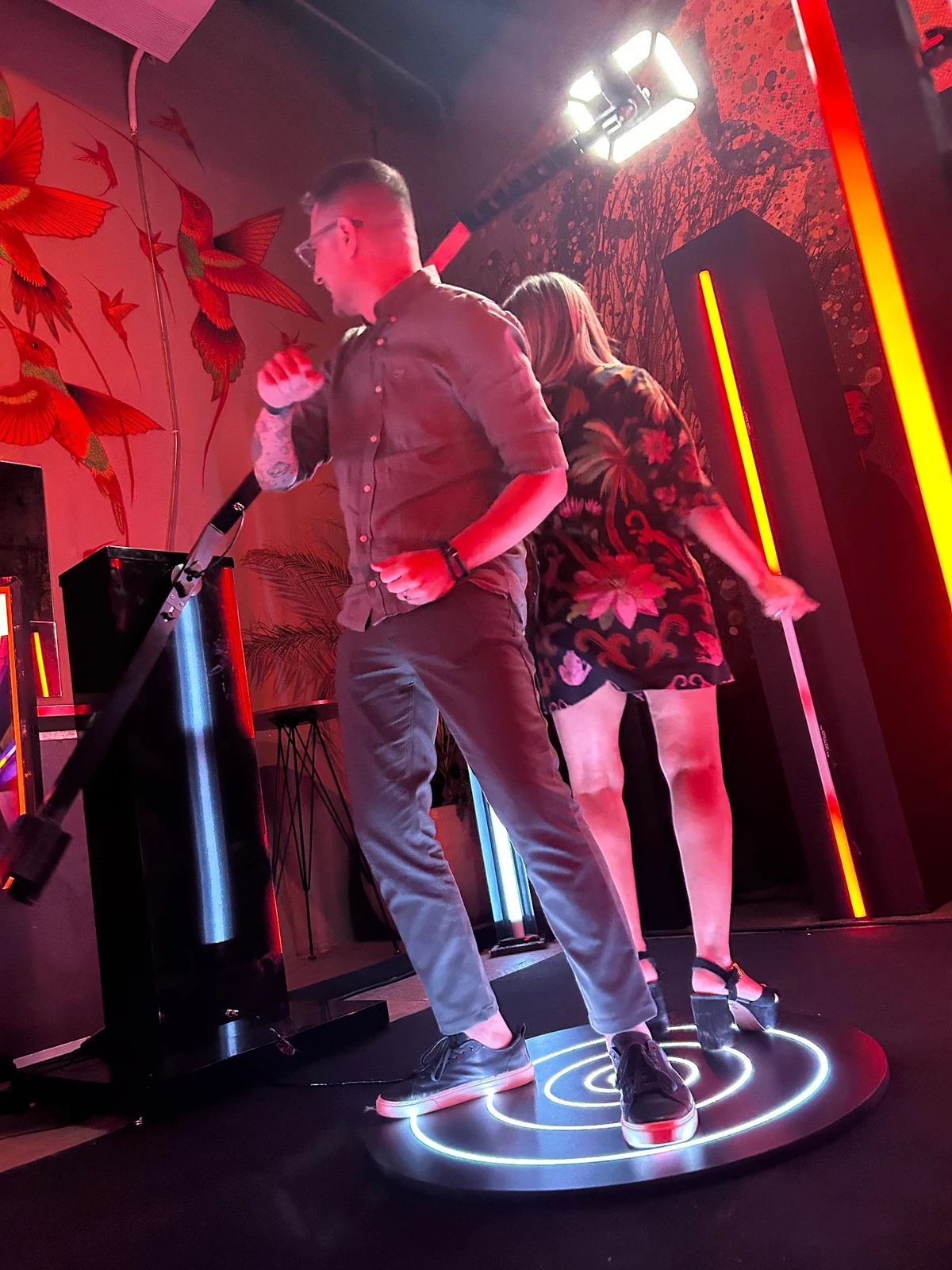 Guests standing on an illuminated 180 Videobooth platform